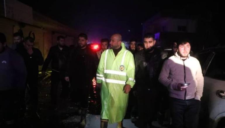 Syria evacuates 173 flood- affected families from camps in western Idlib