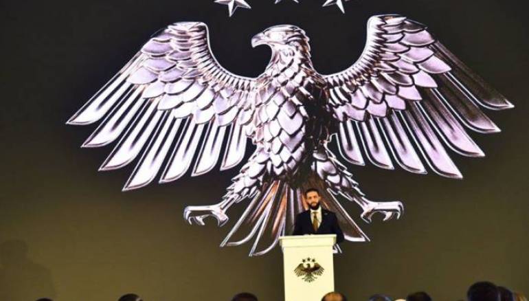 Syrians celebrate the launch of the state's new visual identity
