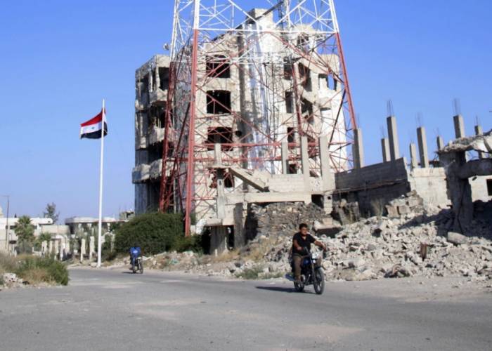 Activists: Fire on truck at Syria-Jordan border crossing