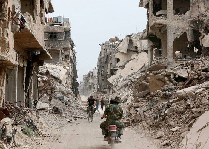 Assad army, allied militias loot Yarmouk camp property: monitor