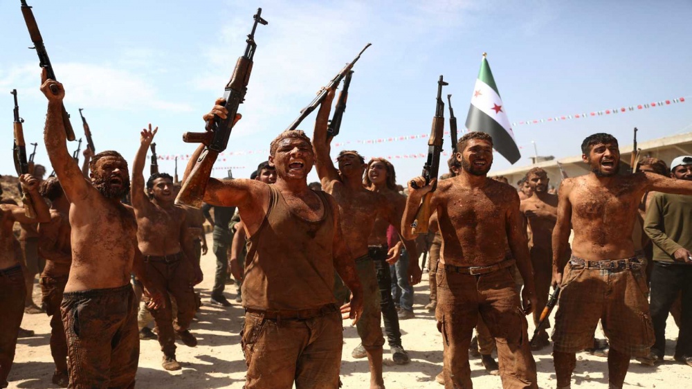 Syrian opposition split on timing of Assad military offensive
