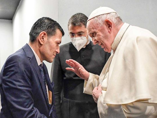Pope meets father of drowned Syrian refugee boy
