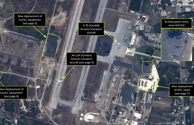 This September 2015 satellite image with annotations provided by GeoNorth, AllSource Analysis, Airbus shows Russian transport aircraft, helicopters, tanks, trucks and armed personnel carriers at an air base in Latakia province, Syria. (GeoNorth, AllSource Analysis, Airbus via AP)