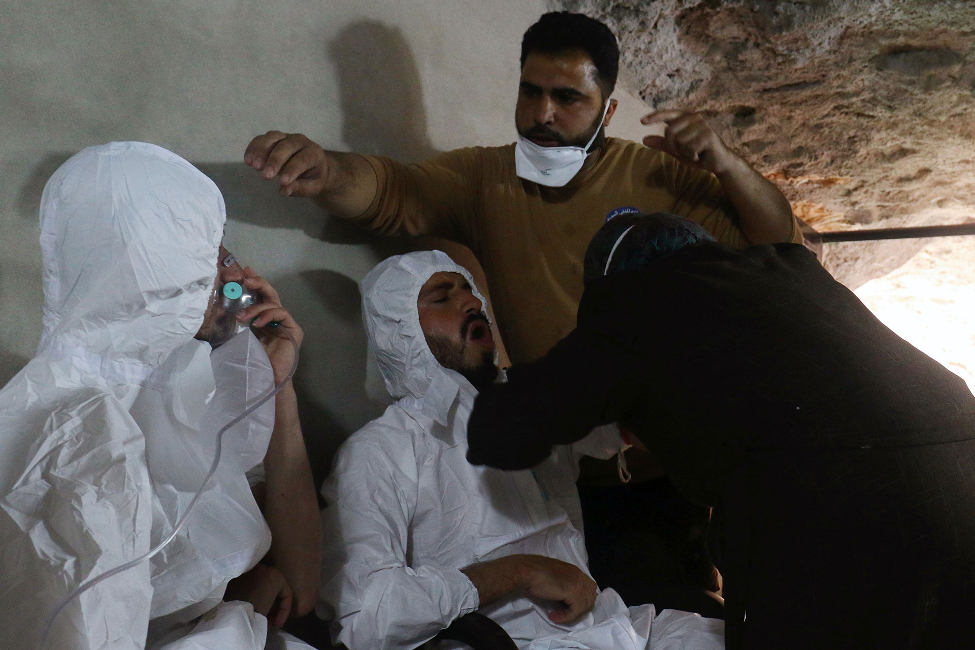 SUFFOCATING: Victims of a gas attack in the town of Khan Sheikhoun in rebel-held Idlib, Syria in April, 2017. REUTERS/Ammar Abdullah