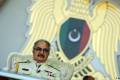 Libya's Haftar says suspends military role, ahead of polls