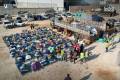263 families leave northern Syria camps in voluntary return convoy