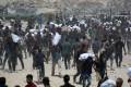 Gaza civil defense says 20 killed by overturned aid truck