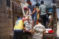 More than 100 families leave northern Syria camps under voluntary return program