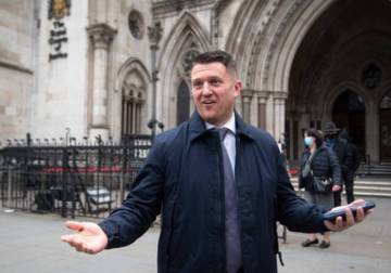 Tommy Robinson loses libel case against Syrian schoolboy