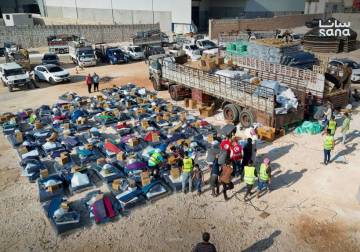 263 families leave northern Syria camps in voluntary return convoy