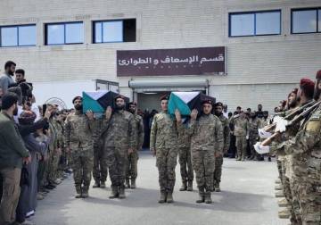 Eleven soldiers, martyred in Deir Ezzor blast, escorted to their final place