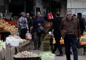 When does market economy intersect with Syrian citizen's dignity?