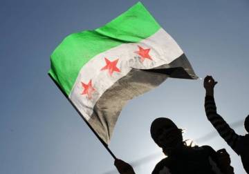 Trump to sign order related to Syria sanctions easing, CBS News reports