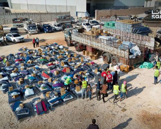 263 families leave northern Syria camps in voluntary return convoy