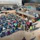263 families leave northern Syria camps in voluntary return convoy